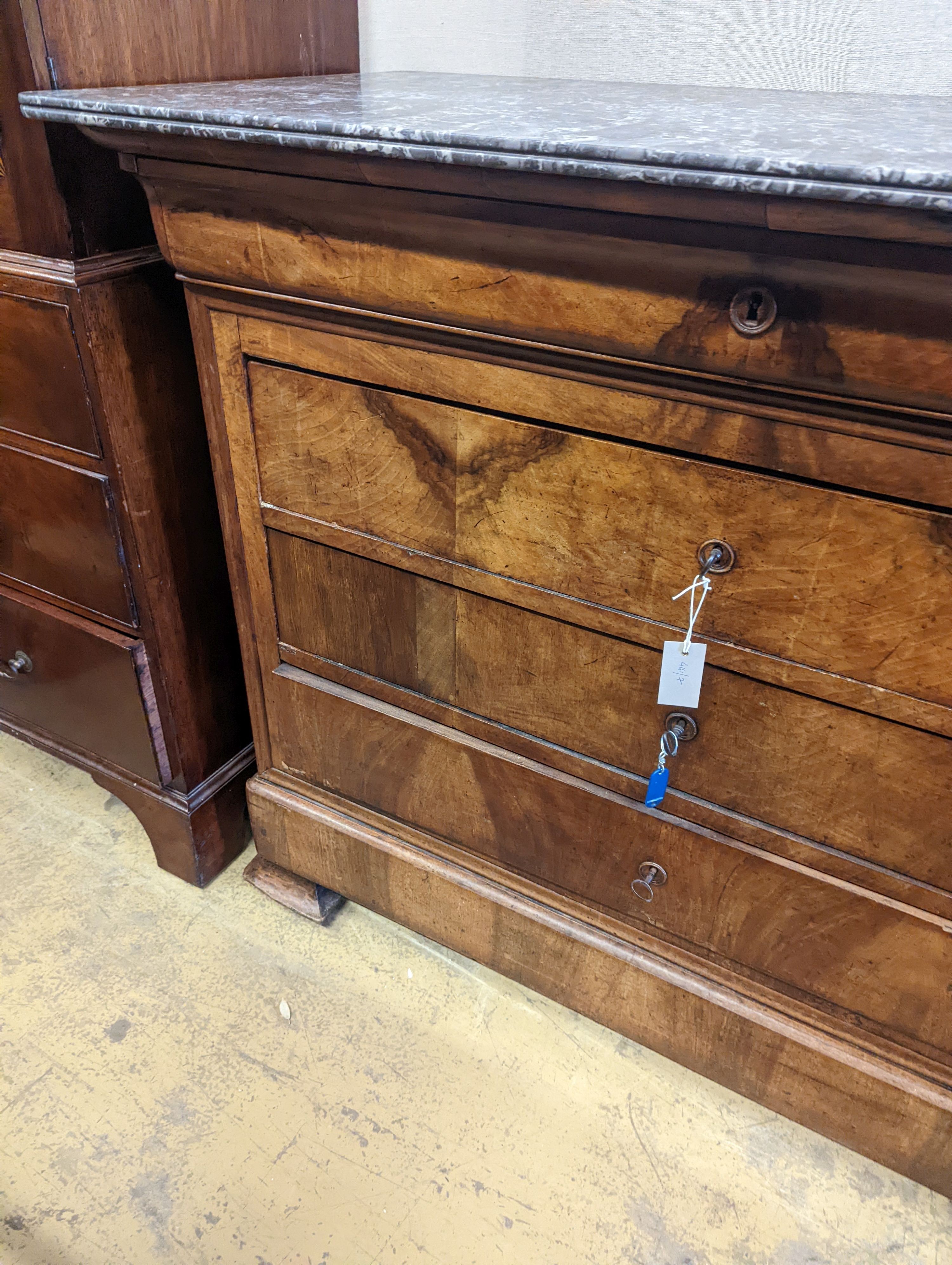 A 19th century French walnut marble topped commode, width 131cm, depth 61cm, height 103cm